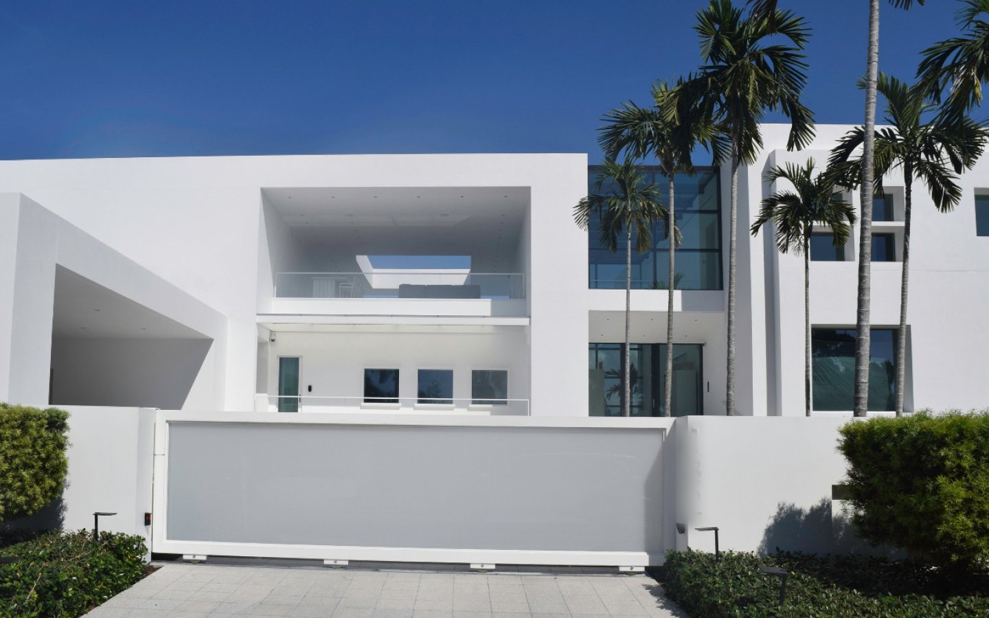 Same home in the original daytime photo